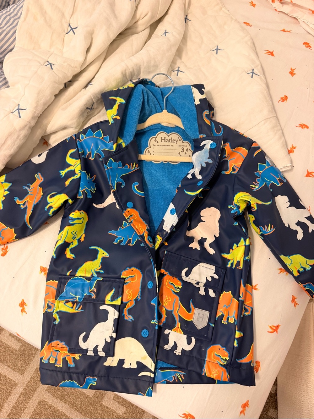 Hatley Navy Dinosaur Print Kids Raincoat with Bright Multicolor Dinos